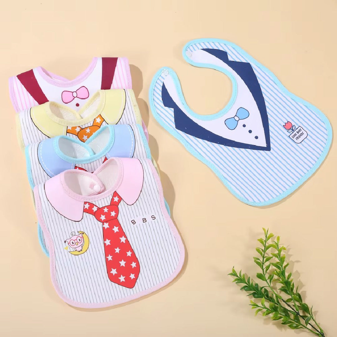 Set of colorful baby bibs with cartoon designs on a beige background